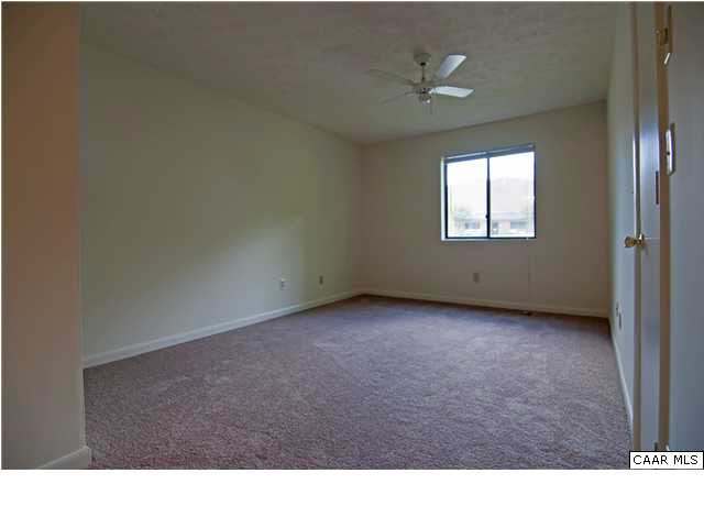 128 Turtle Creek Road, Unit 8 Charlottesville, VA 22901 - Photo 5 of 6 a black and white photo of a room