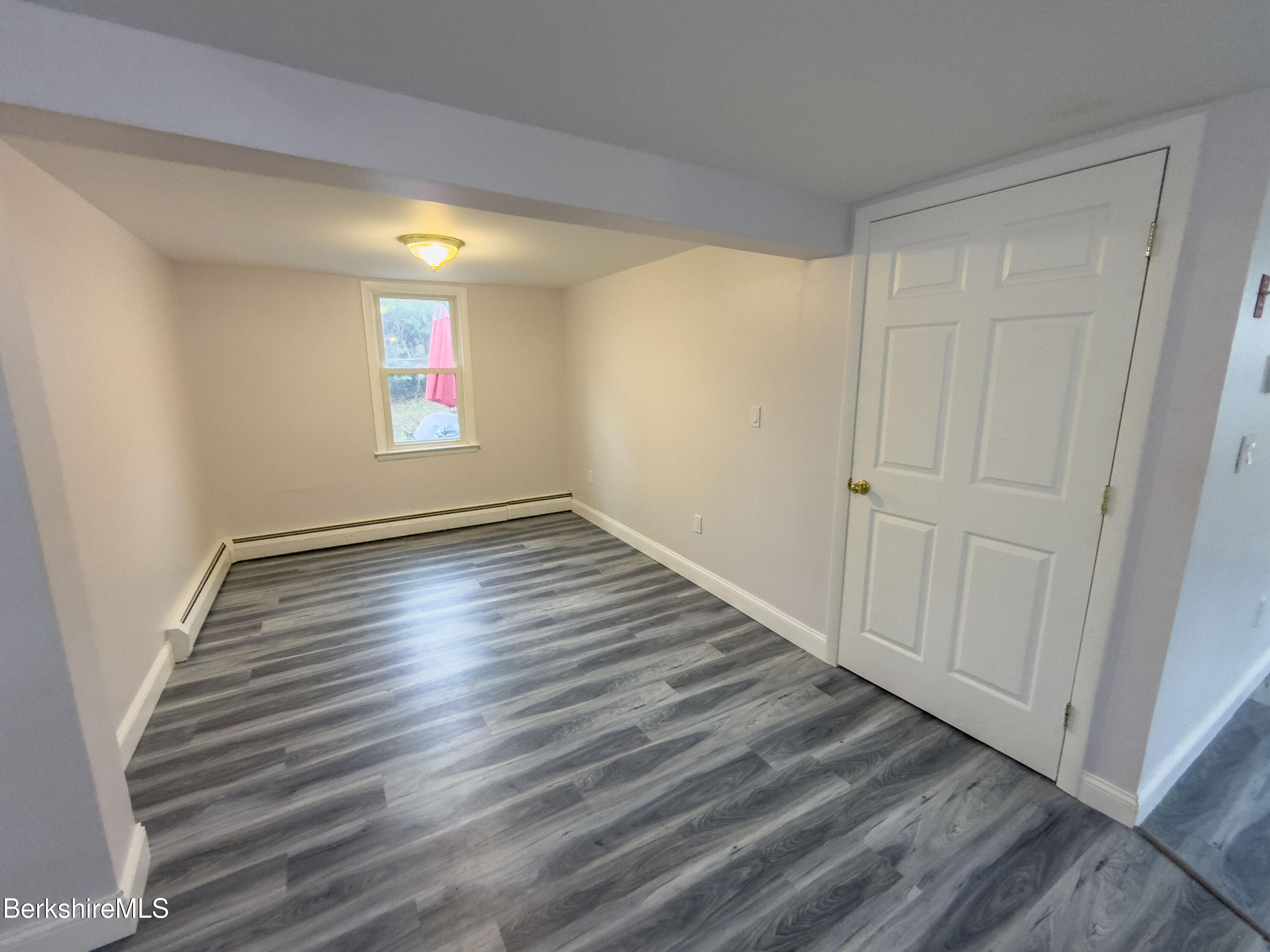 10 Enterprise Street Adams, MA 01220 - Photo 5 of 14 a view of a room with wooden floor and white walls