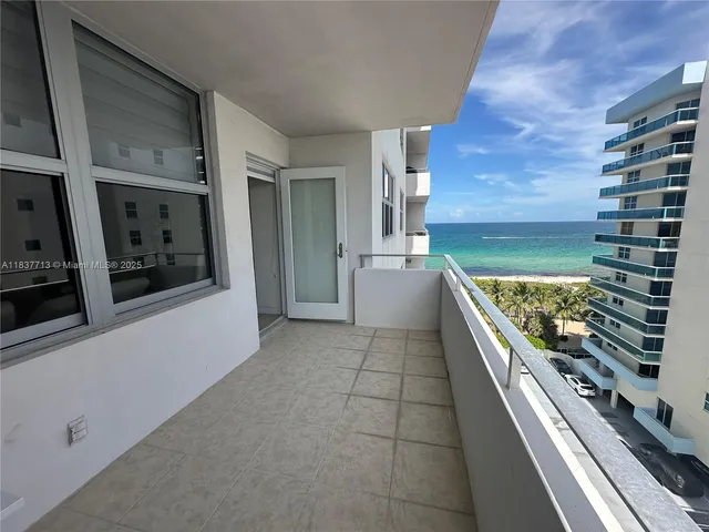 a kitchen with a stove and a refrigerator