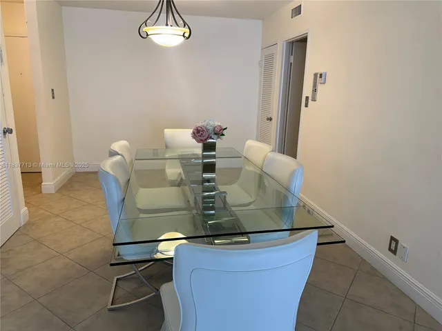 a view of kitchen with furniture and window