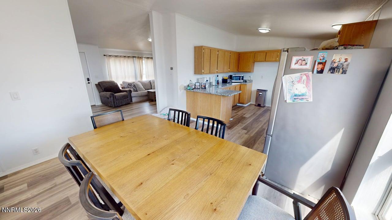 102 Bastian Road Battle Mountain, NV 89820 - Photo 14 of 38 a view of kitchen and dining area with furniture
