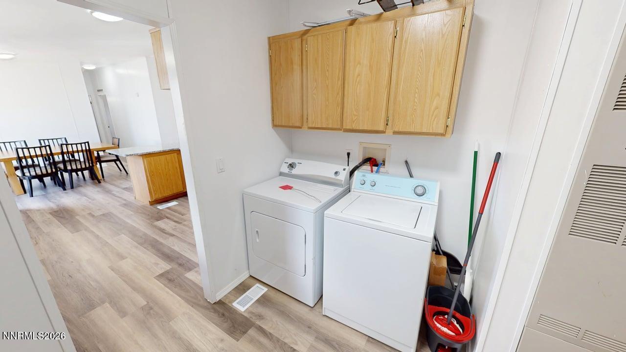 102 Bastian Road Battle Mountain, NV 89820 - Photo 20 of 38 a utility room with dryer and washer