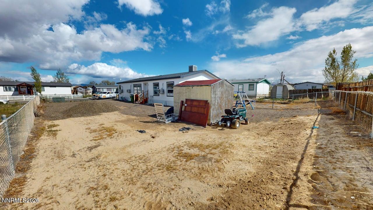 102 Bastian Road Battle Mountain, NV 89820 - Photo 36 of 38 a view of a yard with snow on the road