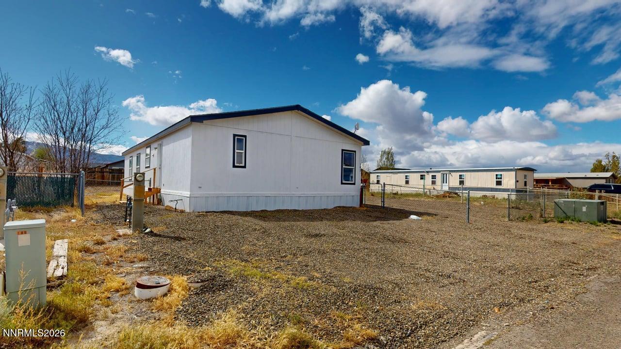 102 Bastian Road Battle Mountain, NV 89820 - Photo 4 of 38 a view of a house with a yard