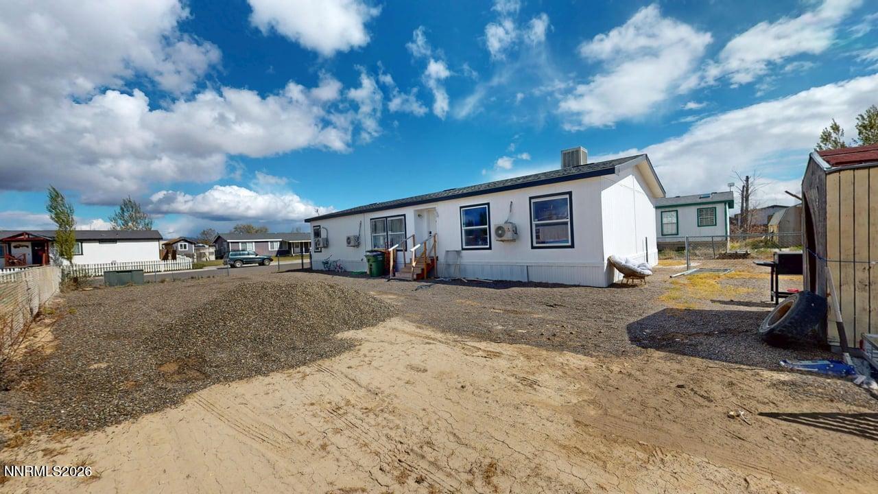 102 Bastian Road Battle Mountain, NV 89820 - Photo 6 of 38 a view of a house with a patio