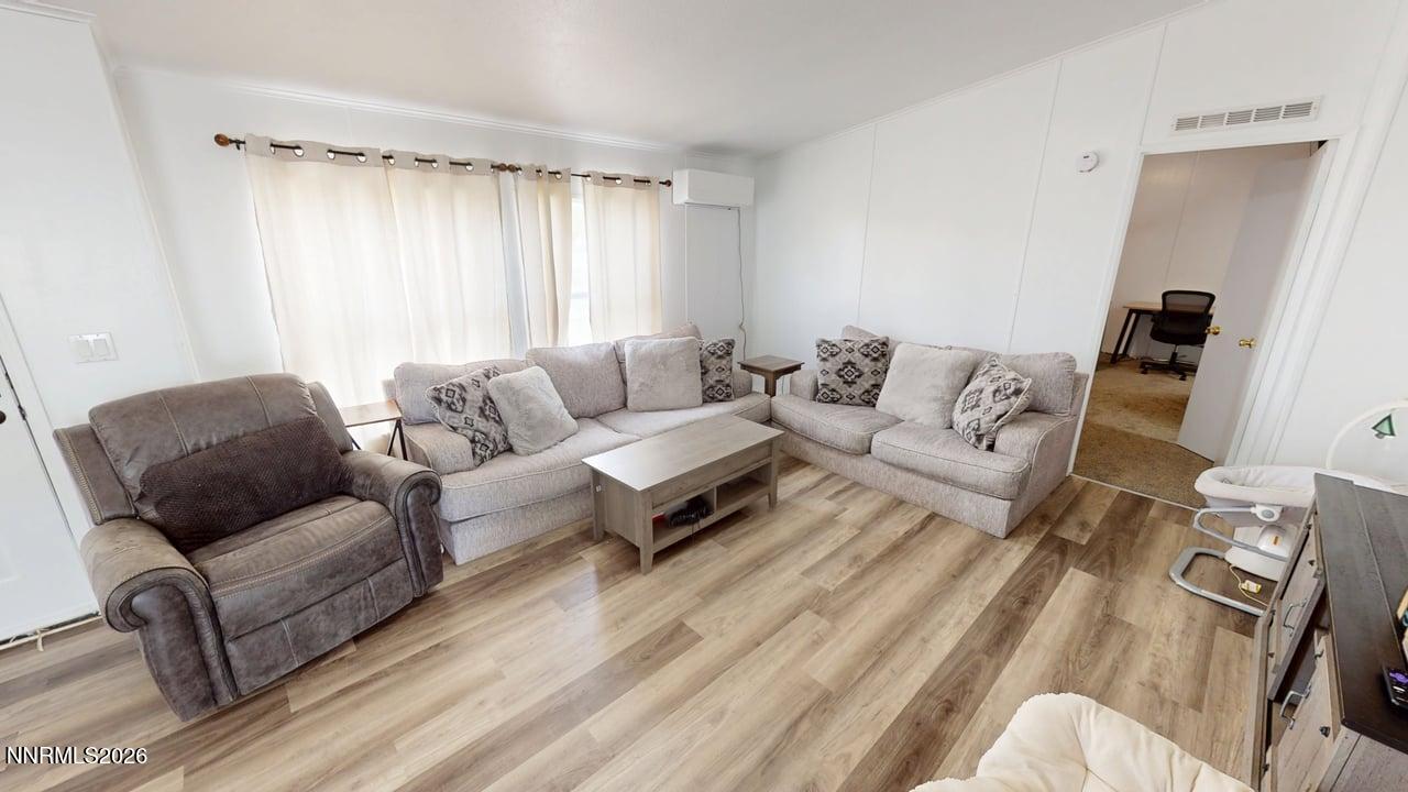 102 Bastian Road Battle Mountain, NV 89820 - Photo 8 of 38 a living room with furniture and a couch