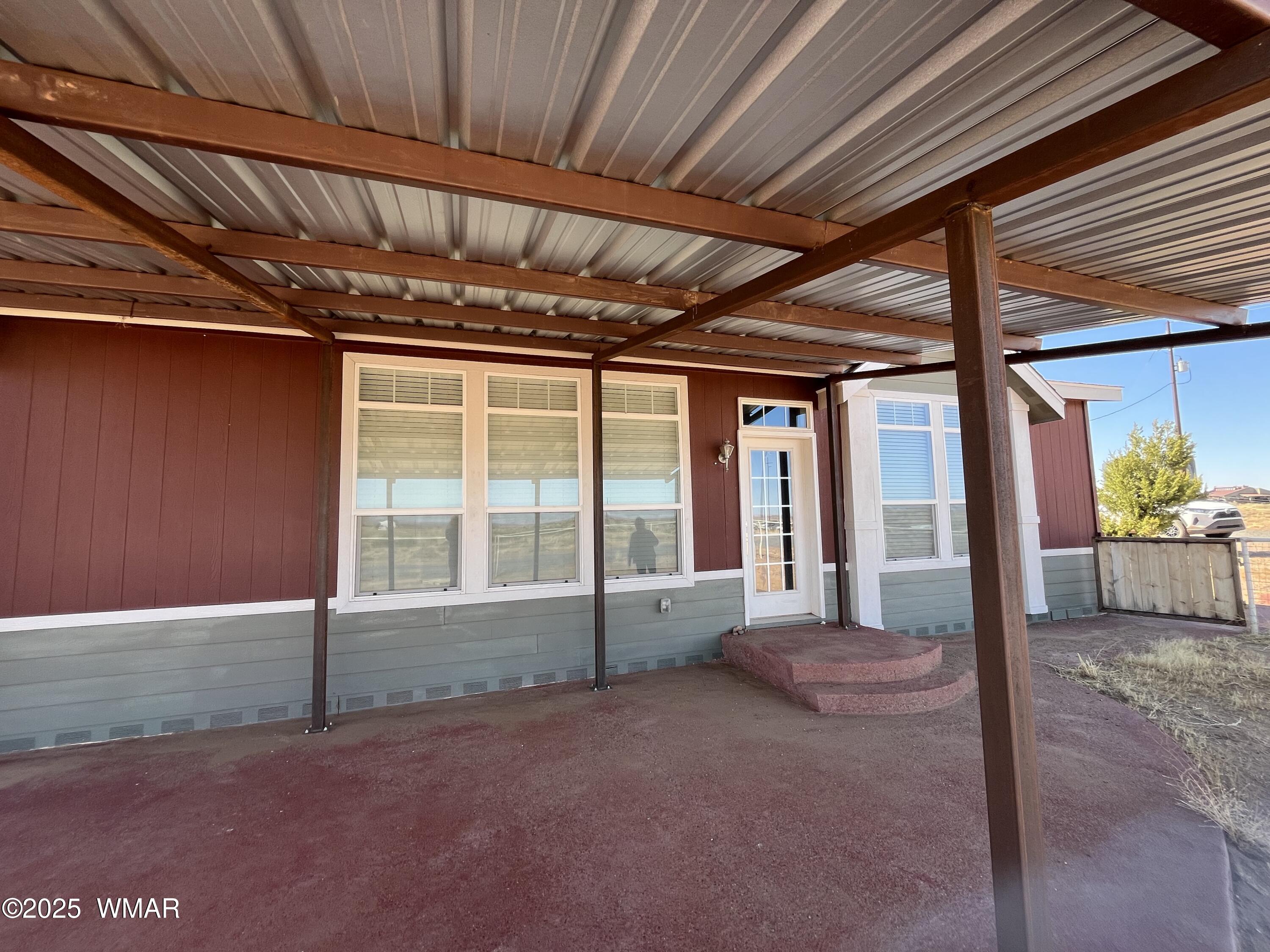 232 Savage Street Snowflake, AZ 85937 - Photo 6 of 40 Covered front porch with cement apron