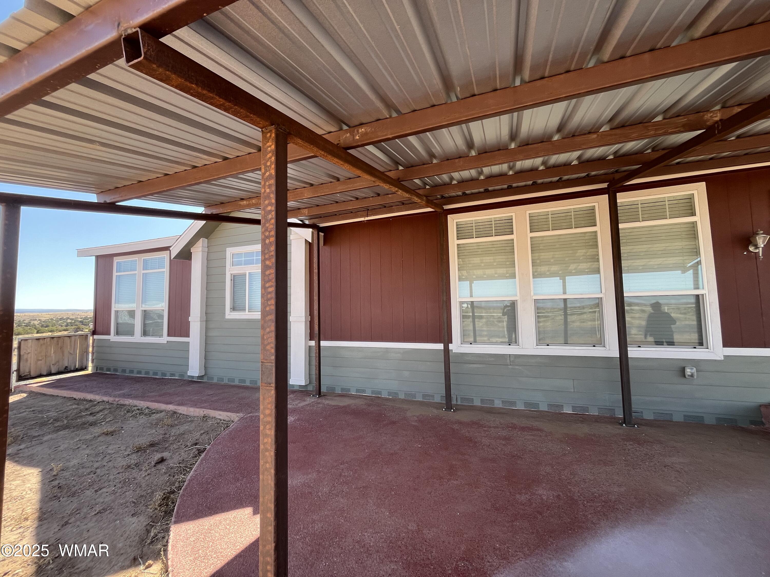 232 Savage Street Snowflake, AZ 85937 - Photo 8 of 40 Covered front porch with cement apron