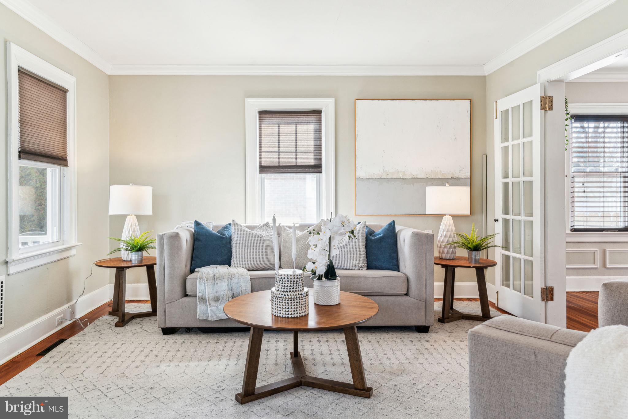 77 Concord Avenue Hamilton, NJ 08619 - Photo 1 of 45 a living room with furniture and a table