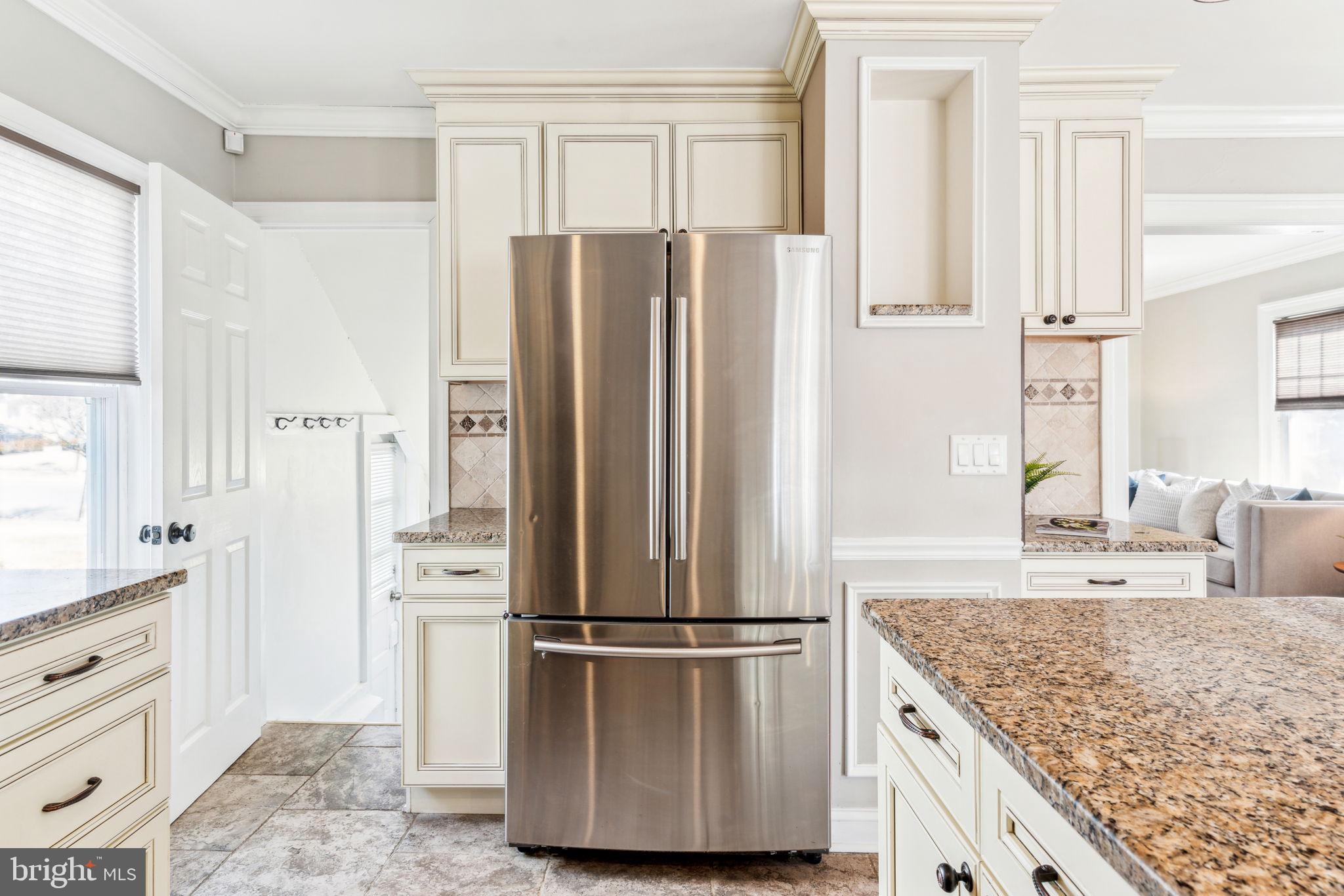 77 Concord Avenue Hamilton, NJ 08619 - Photo 14 of 45 a kitchen with stainless steel appliances granite countertop a refrigerator and a sink
