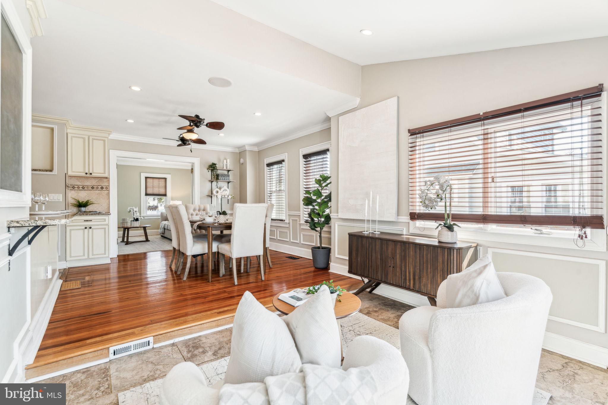 77 Concord Avenue Hamilton, NJ 08619 - Photo 17 of 45 a living room with furniture large window and wooden floor