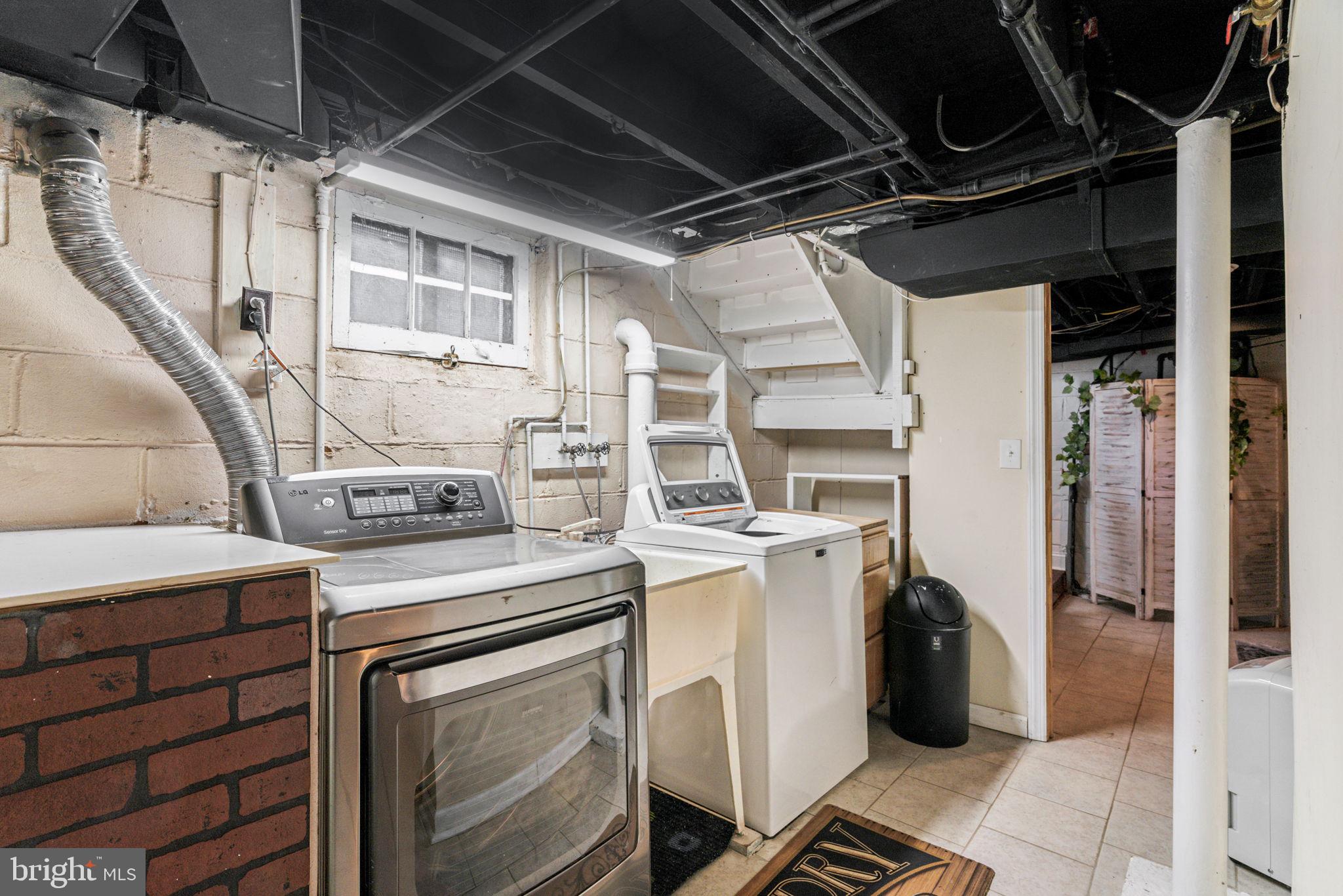 77 Concord Avenue Hamilton, NJ 08619 - Photo 22 of 45 a utility room with dryer and washer
