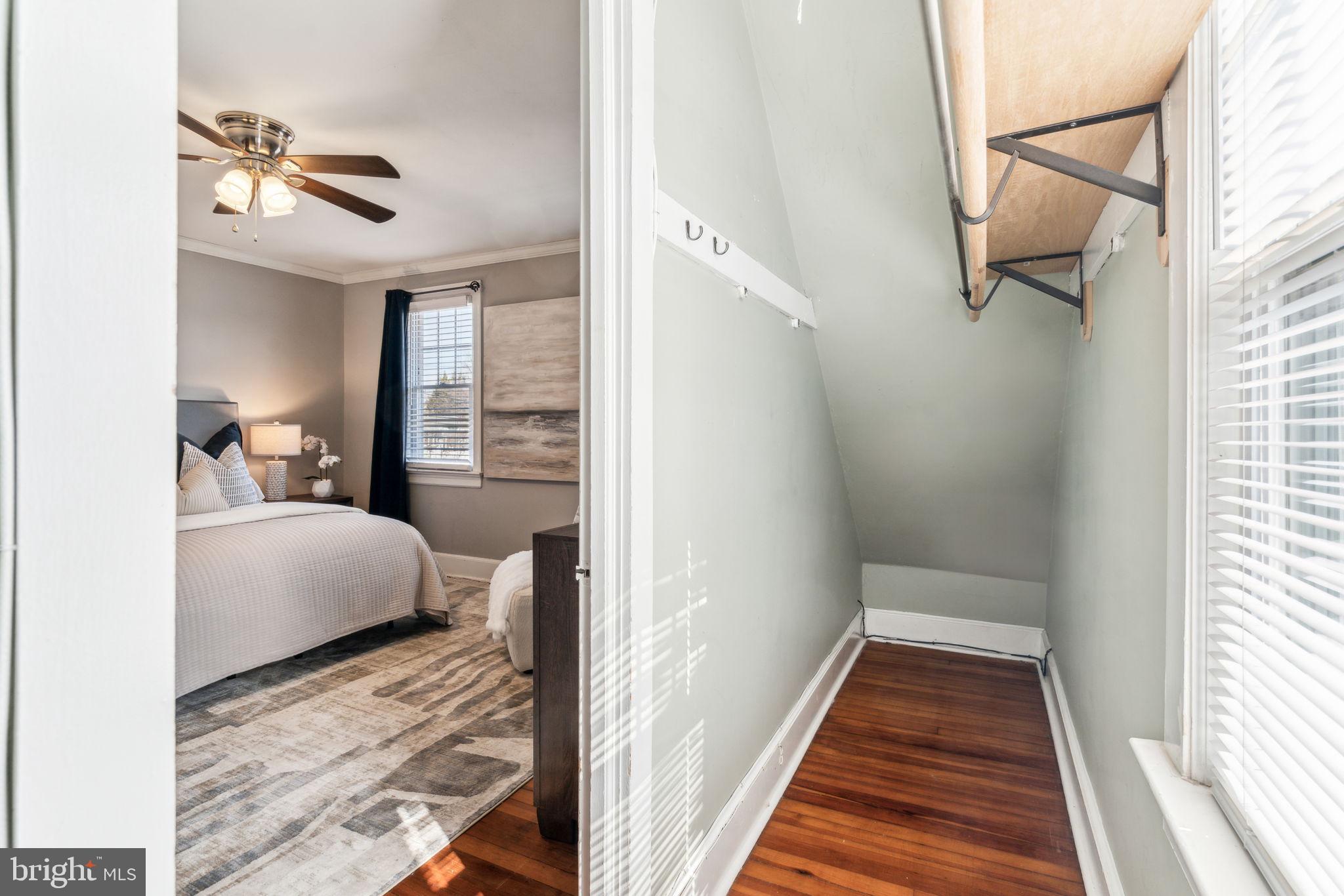 77 Concord Avenue Hamilton, NJ 08619 - Photo 26 of 45 a bedroom with a bed and wooden floor