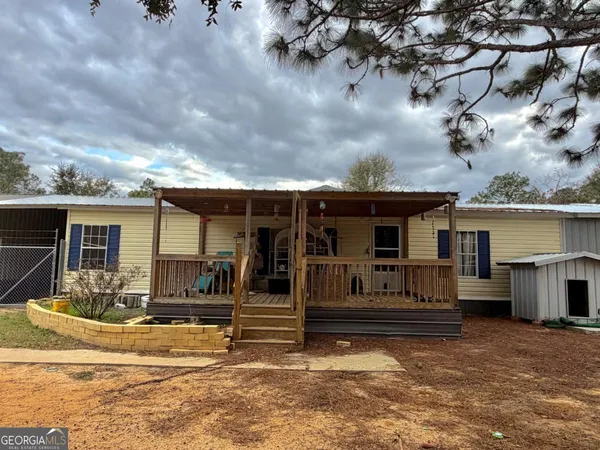 a view of a house with a patio