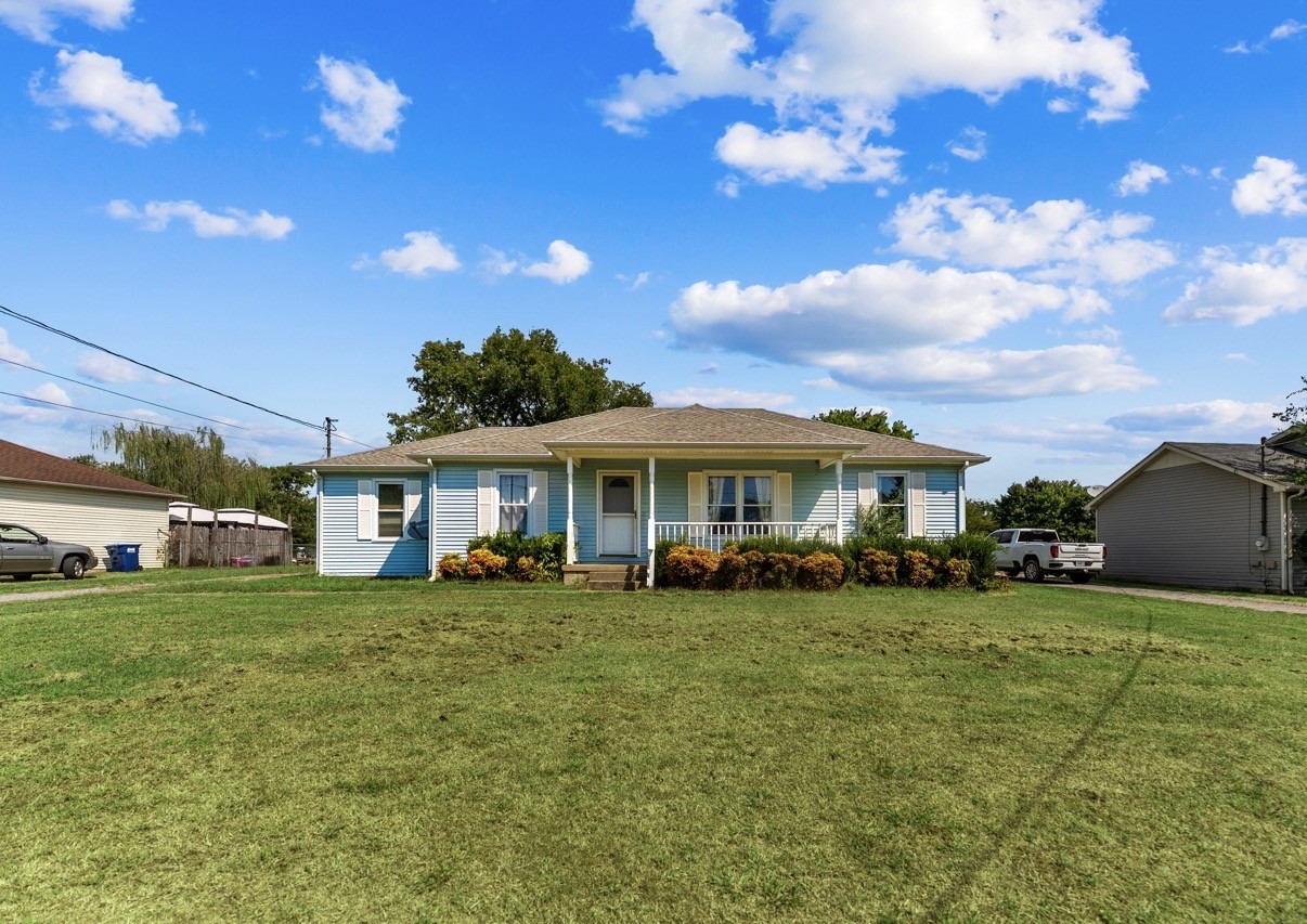 a view of a house with a big yard