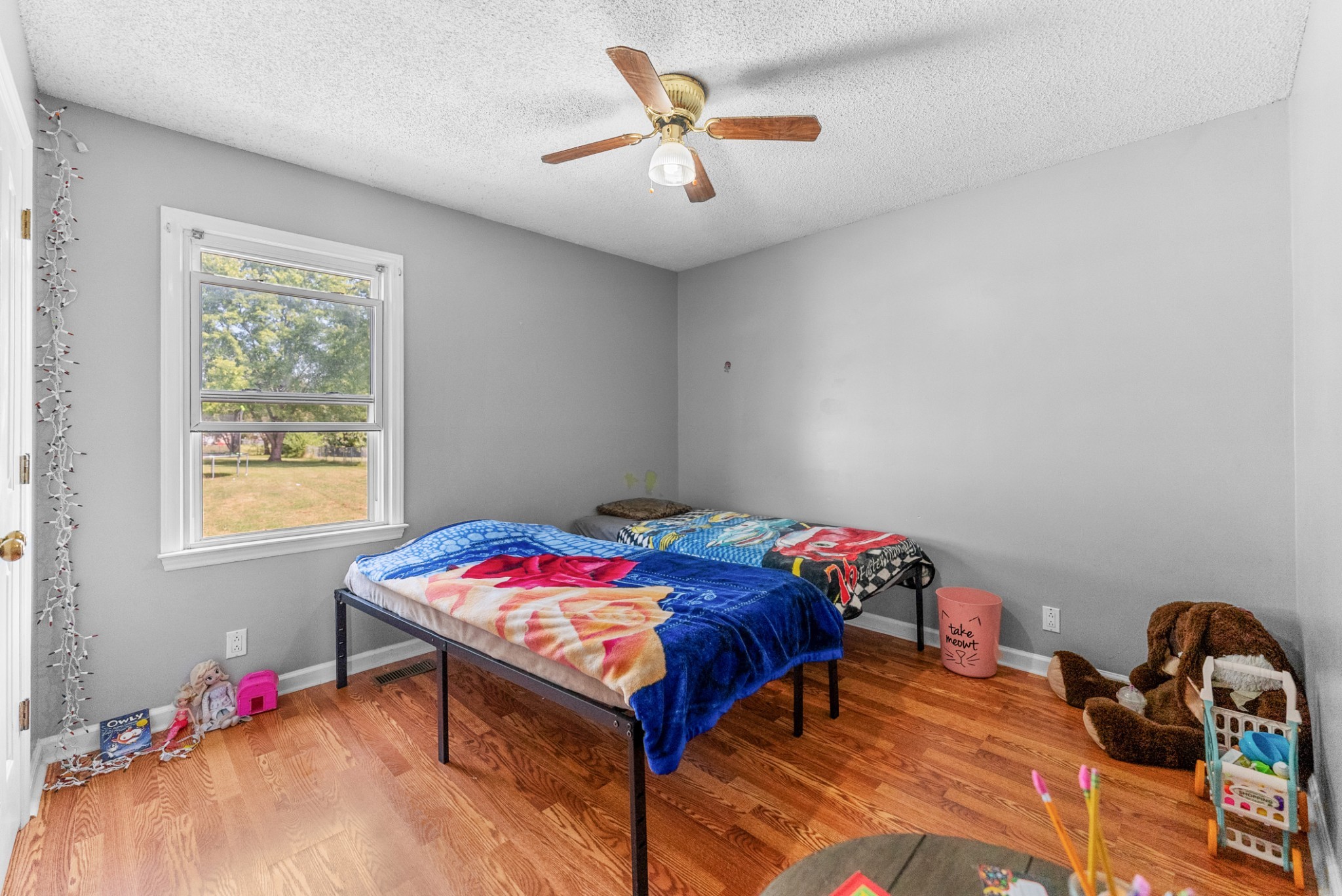 5342 Keystone Court Murfreesboro, TN 37129 - Photo 6 of 21 a bedroom with a bed and a chandelier