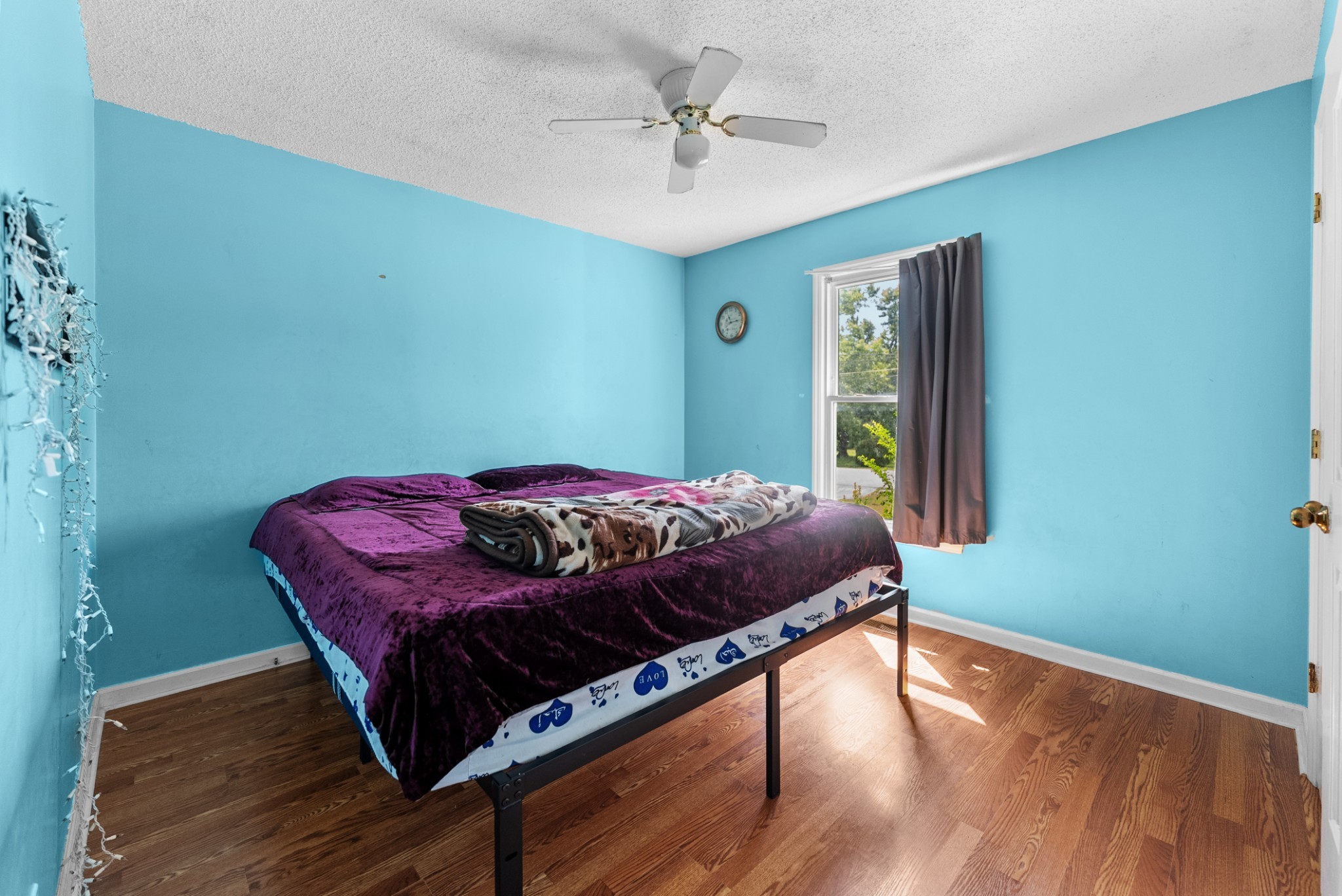 5342 Keystone Court Murfreesboro, TN 37129 - Photo 7 of 21 a bedroom with a bed and a chandelier