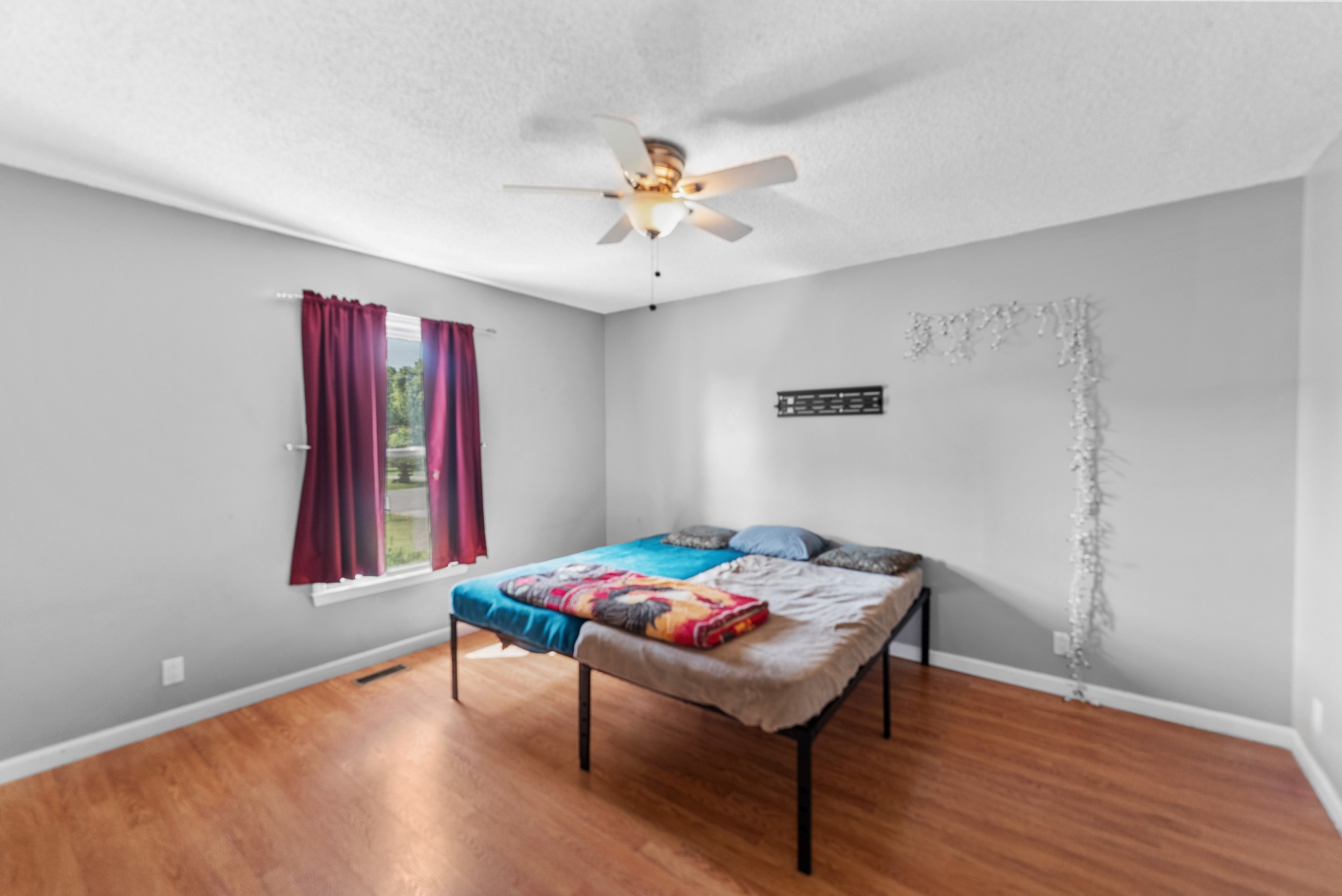 5342 Keystone Court Murfreesboro, TN 37129 - Photo 8 of 21 a bedroom with a table and a chandelier