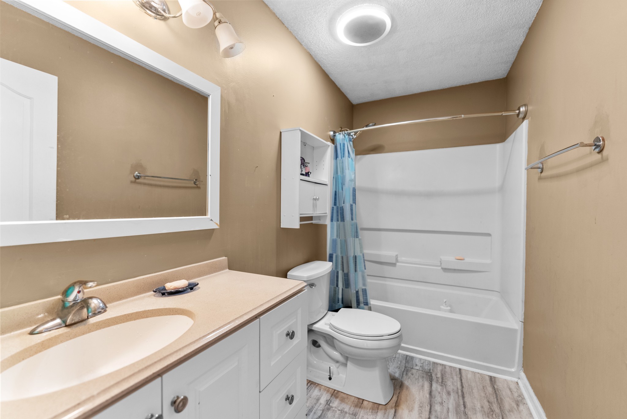 5342 Keystone Court Murfreesboro, TN 37129 - Photo 9 of 21 a bathroom with a sink a toilet and shower