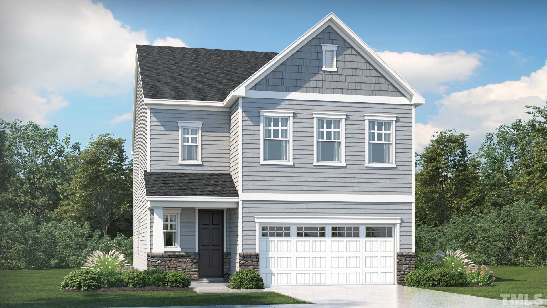 3937 Mount Moran Road Raleigh, NC 27616 - Photo 1 of 18 a front view of a house with garden