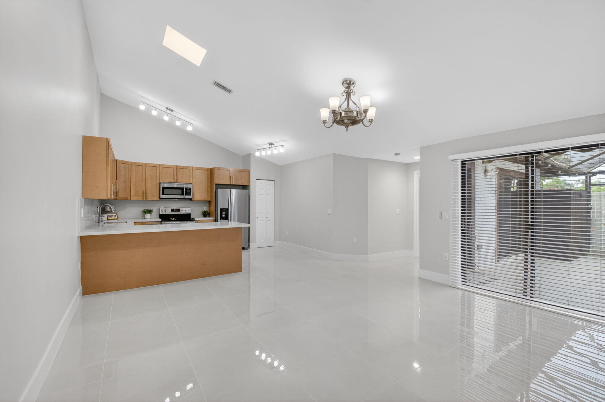 9939 Boca Gardens Trail, Unit D Boca Raton, FL 33496 - Photo 9 of 26 Kitchen/Living Room