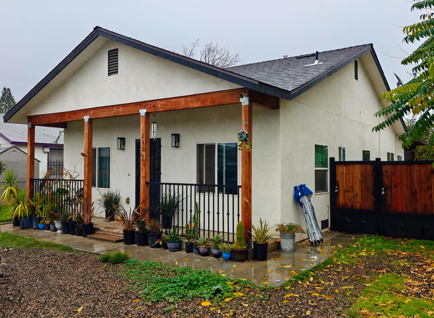 a front view of a house with garden