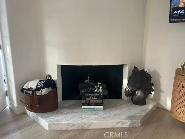 a room with furniture and a fireplace