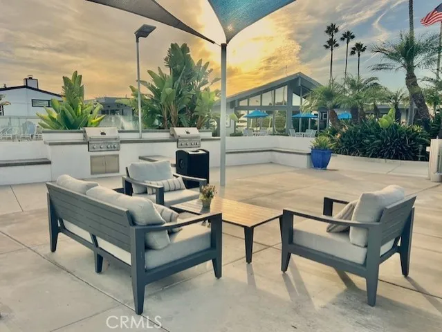 a view of an outdoor sitting area with couch