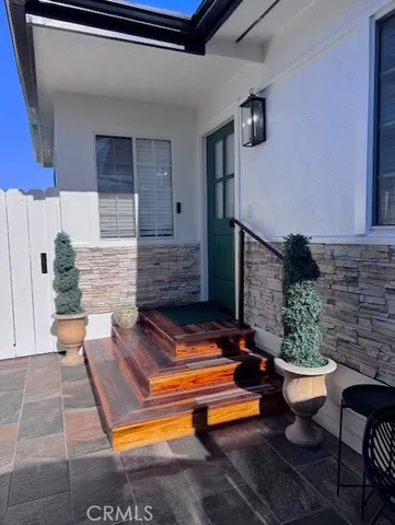 a backyard of a house with seating space