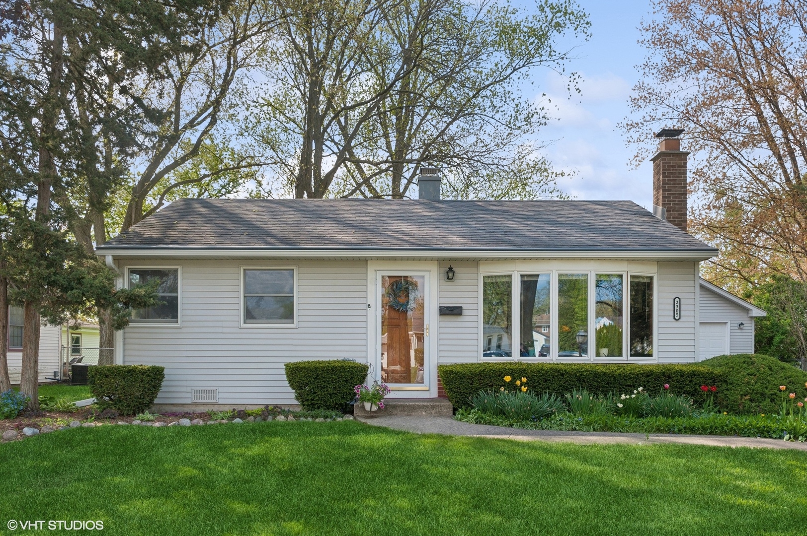 2305 Jay Lane Rolling Meadows, IL 60008 - Photo 1 of 18 a view of front of a house with a yard