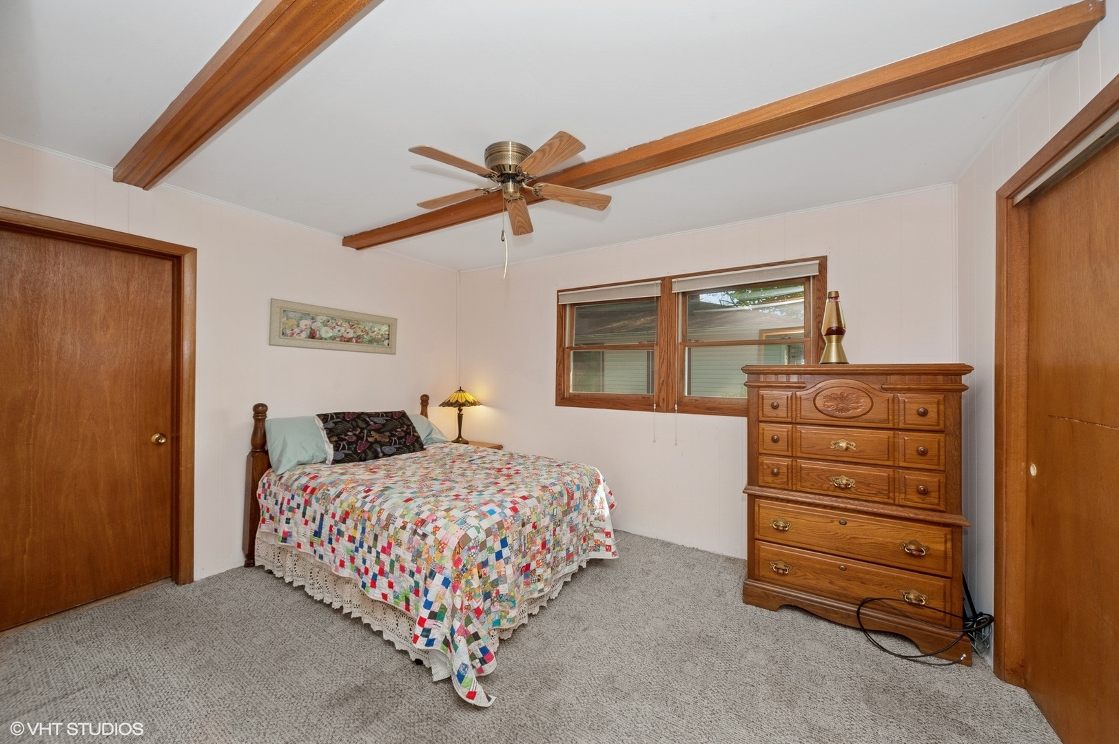 2305 Jay Lane Rolling Meadows, IL 60008 - Photo 11 of 18 a bedroom with a bed and a dresser