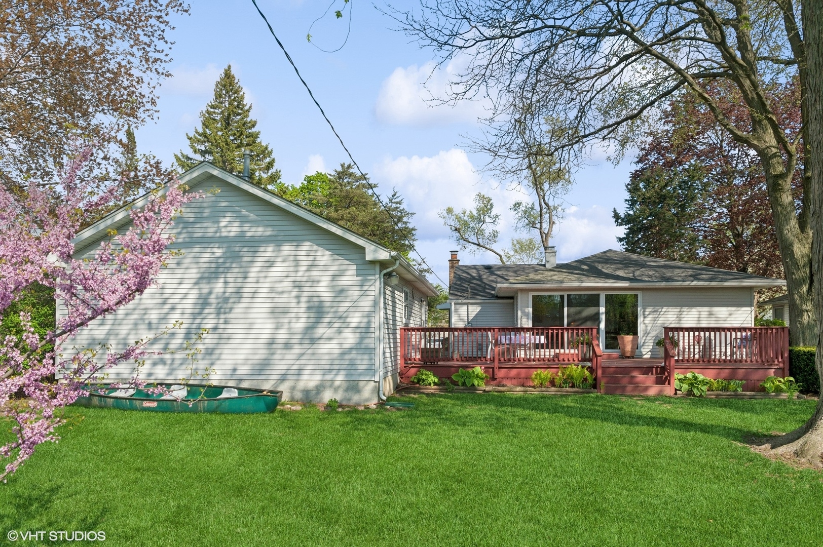 2305 Jay Lane Rolling Meadows, IL 60008 - Photo 16 of 18 a front view of house with yard and outdoor seating