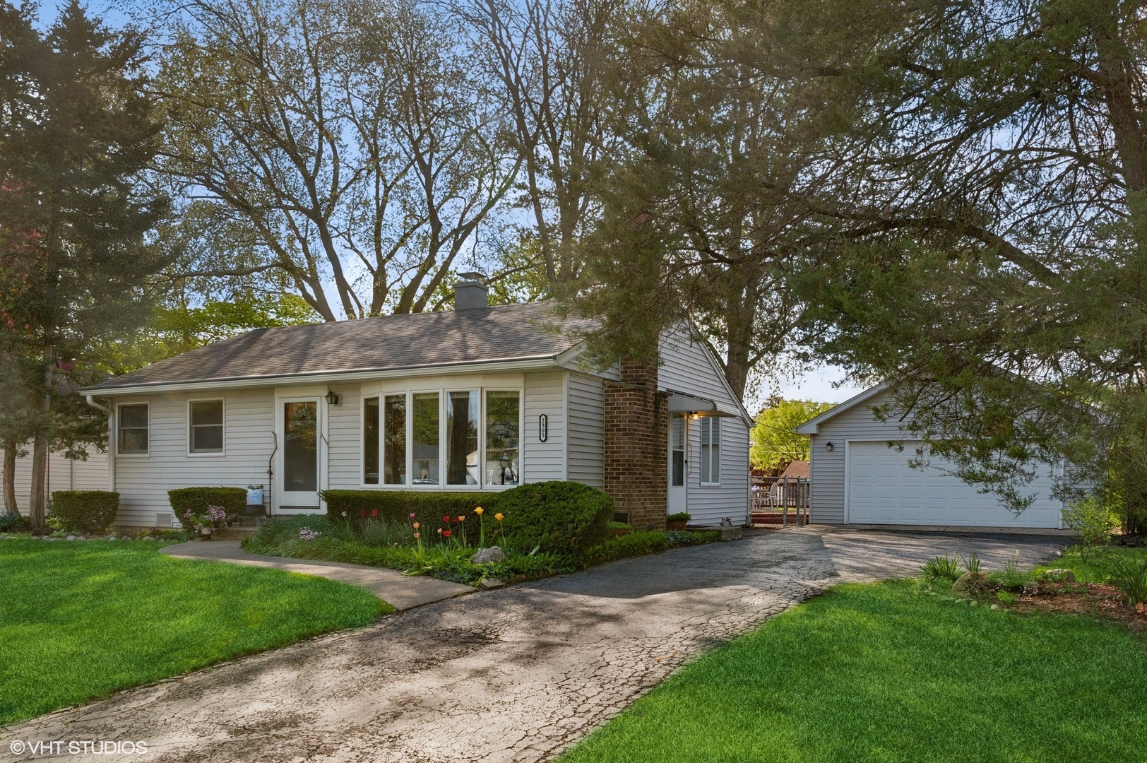 2305 Jay Lane Rolling Meadows, IL 60008 - Photo 2 of 18 front view of a house with a yard
