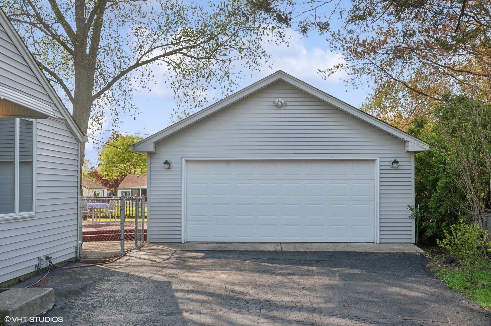 2305 Jay Lane Rolling Meadows, IL 60008 - Photo 3 of 18 a small white house with a outdoor space