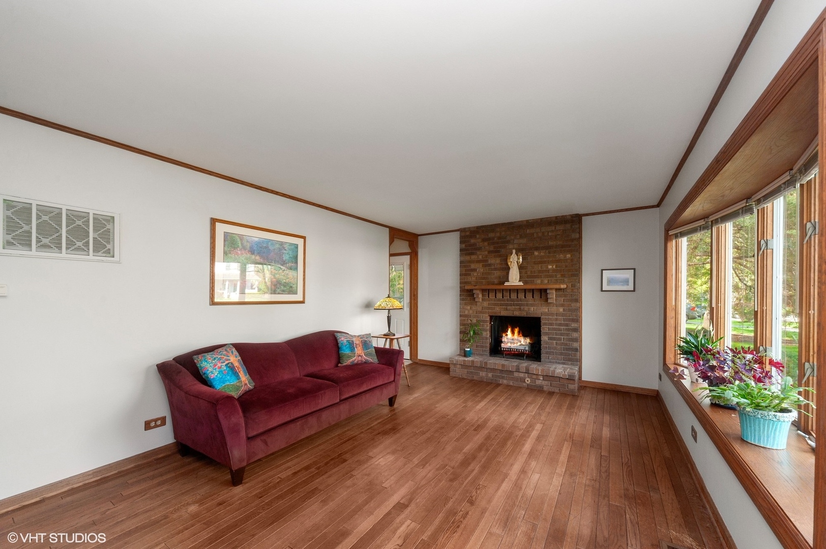 2305 Jay Lane Rolling Meadows, IL 60008 - Photo 4 of 18 a living room with furniture and a fireplace