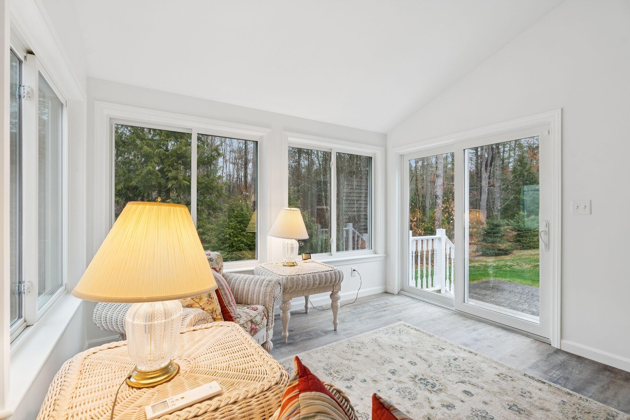 162 Millbrooke Farm Road, Unit 162 Wells, ME 04090 - Photo 18 of 39 Sunroom with slider to patio