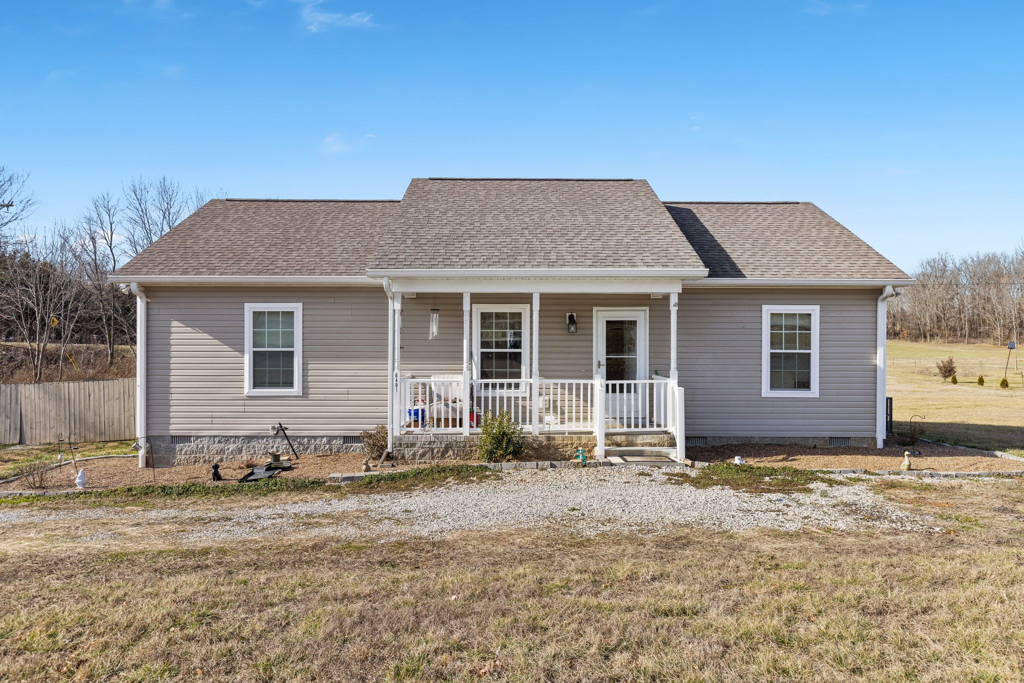 6491 Highway 161 Springfield, TN 37172 - Photo 1 of 32 a front view of a house with a garden
