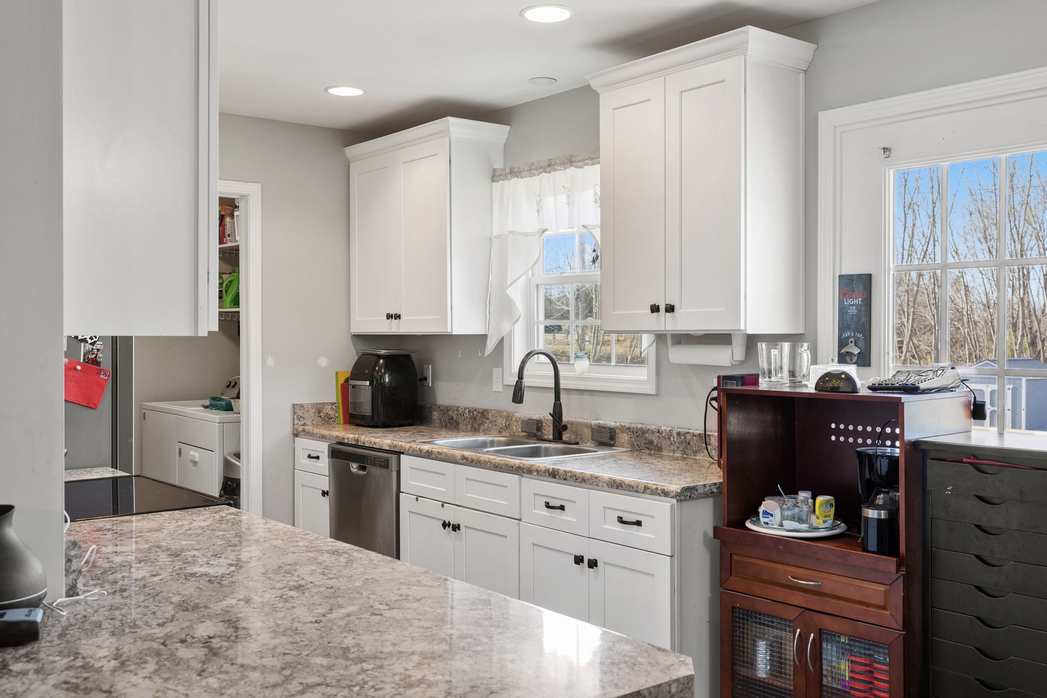 6491 Highway 161 Springfield, TN 37172 - Photo 12 of 32 a kitchen with granite countertop a refrigerator stove and sink