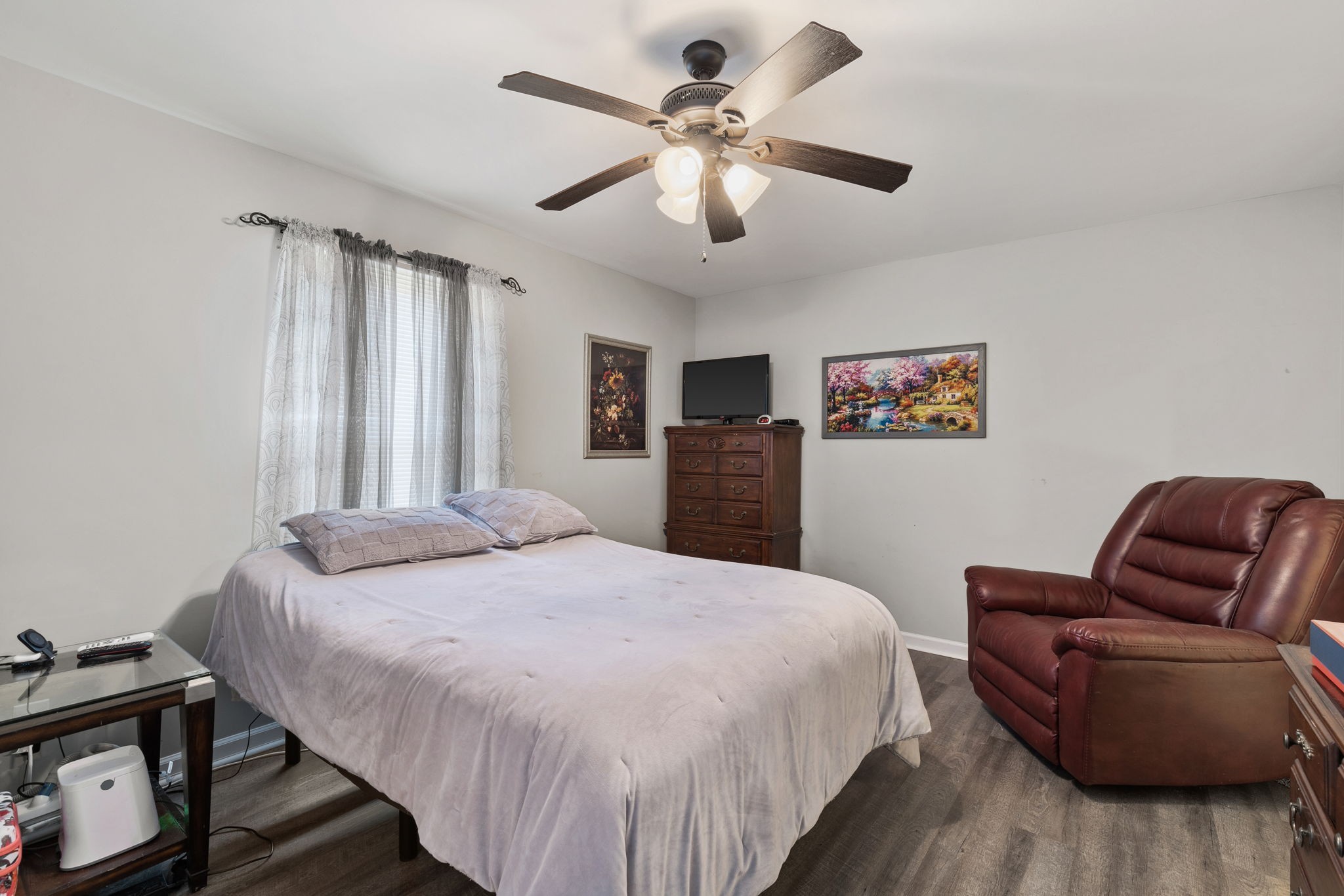 6491 Highway 161 Springfield, TN 37172 - Photo 17 of 32 a bedroom with a bed couch and a window