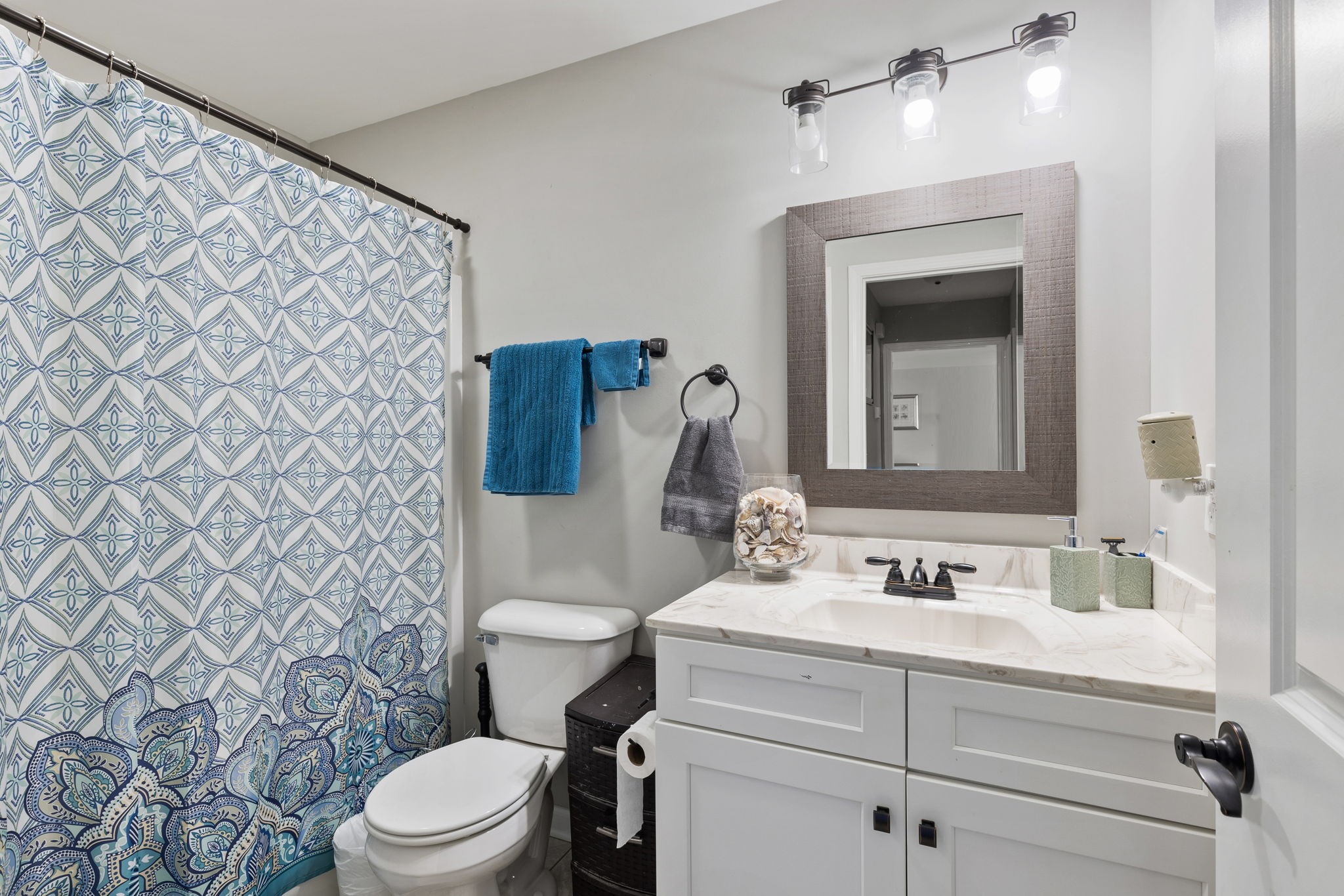 6491 Highway 161 Springfield, TN 37172 - Photo 25 of 32 a bathroom with a sink mirror vanity and toilet