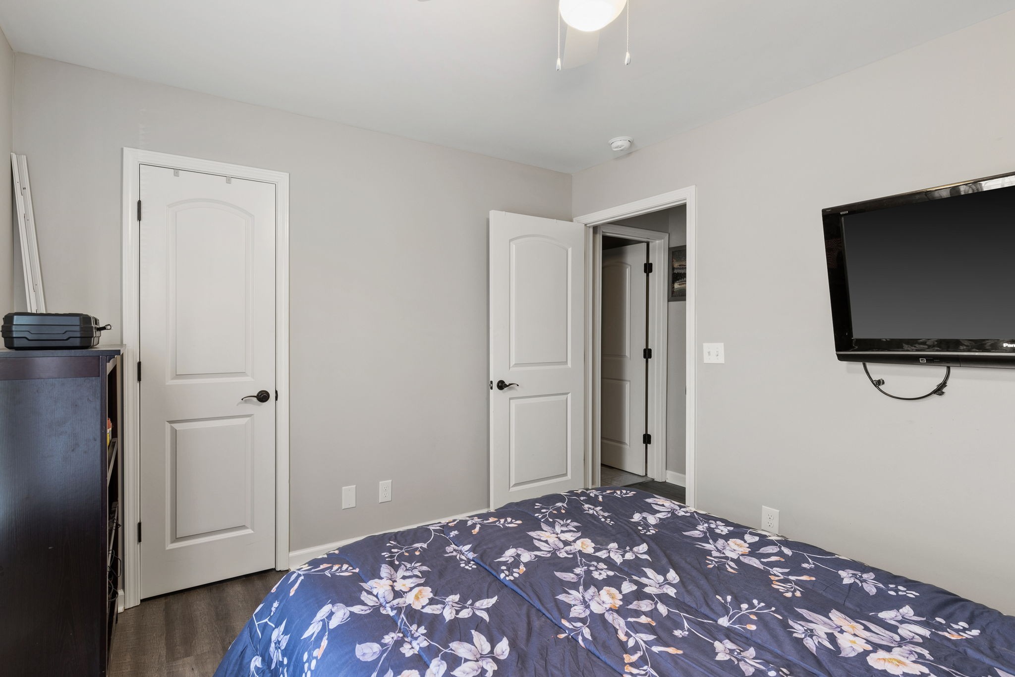 6491 Highway 161 Springfield, TN 37172 - Photo 27 of 32 a bedroom with a bed and wooden floor