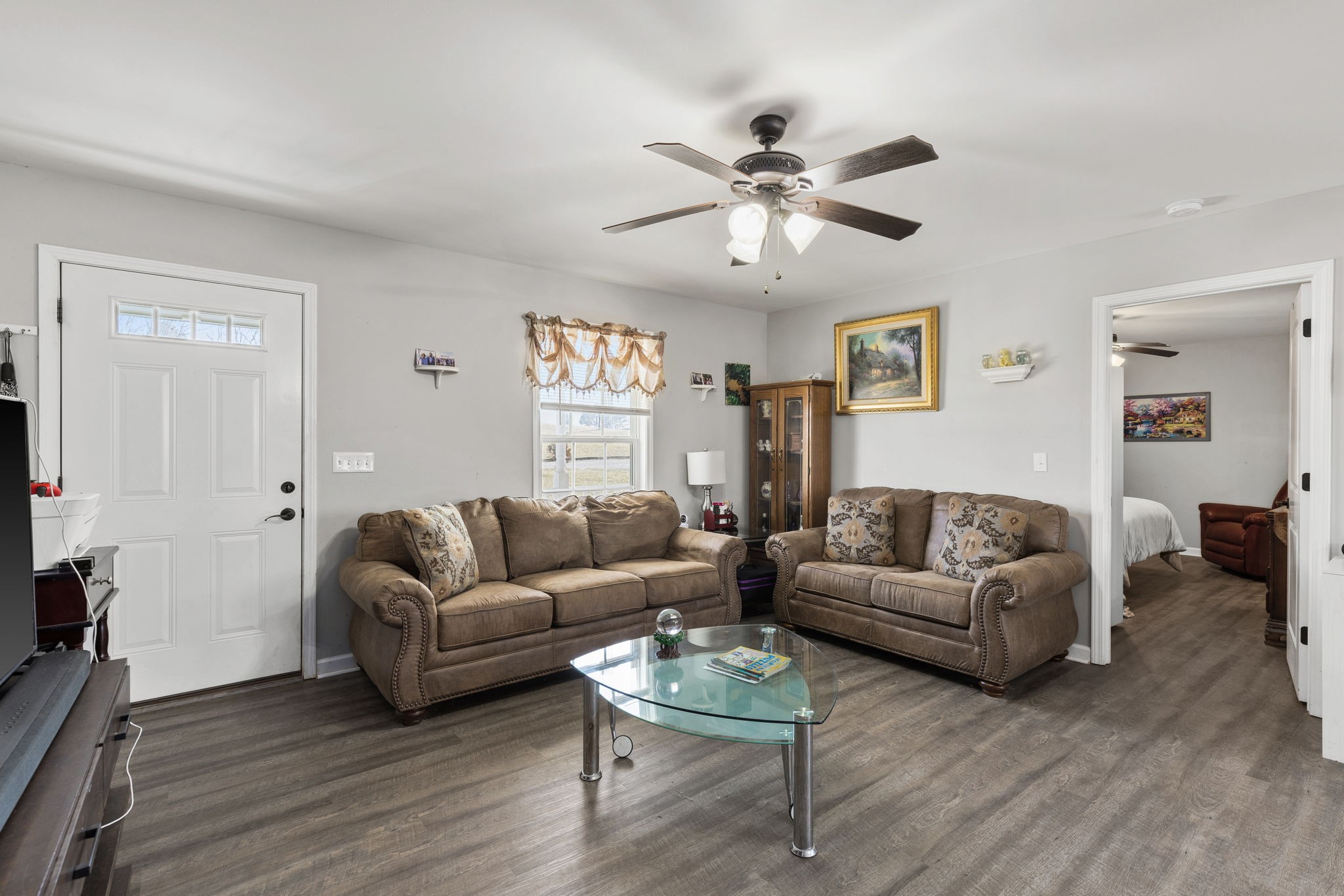 6491 Highway 161 Springfield, TN 37172 - Photo 6 of 32 a living room with furniture and a large window
