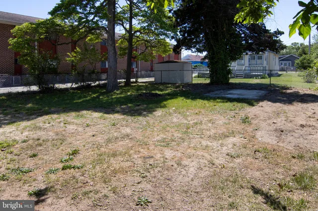 a view of backyard with green space