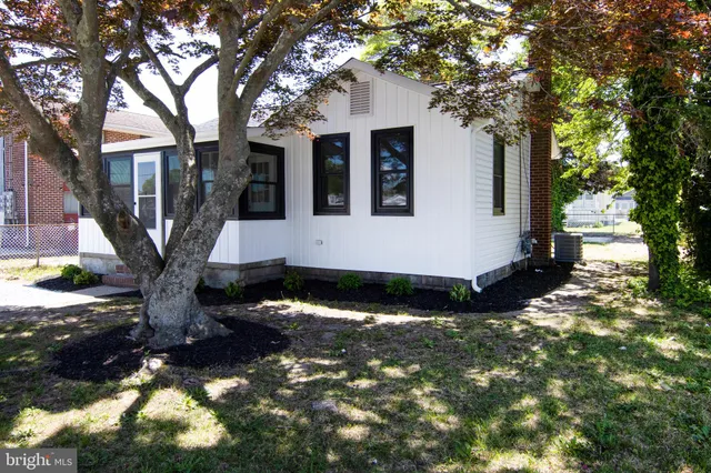 a front view of house with yard
