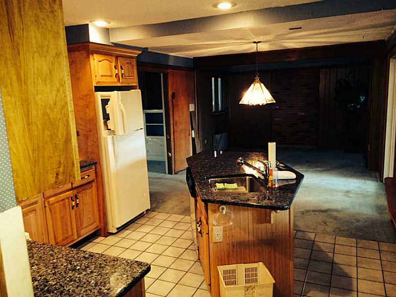 76 Lyndon Road Cranston, RI 02905 - Photo 7 of 20 Kitchen. Kitchen looking back toward dining room area. The dining room area and kitchen opens up to a large porch