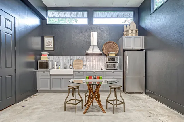 a bed room with a bed and a large mirror