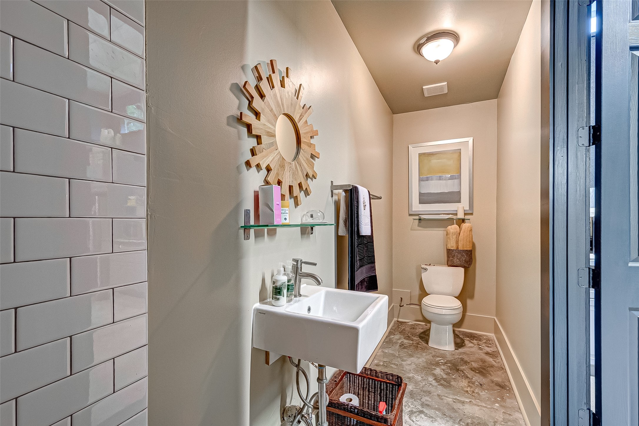 1612 West Alabama Street, Unit ABCD Houston, TX 77006 - Photo 13 of 50 a bathroom with a toilet sink and shower curtain