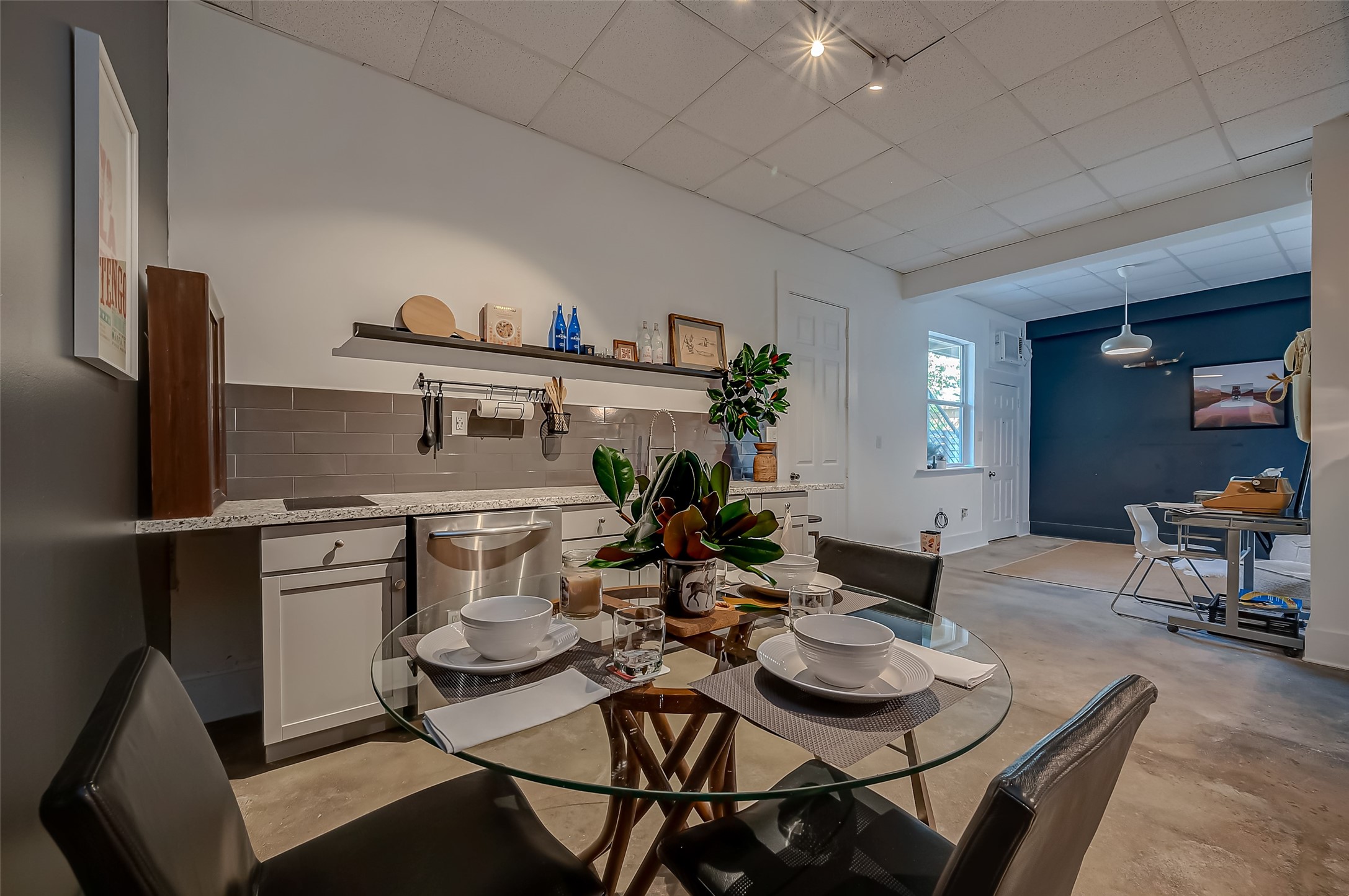 1612 West Alabama Street, Unit ABCD Houston, TX 77006 - Photo 20 of 50 a kitchen with a table and chairs in it