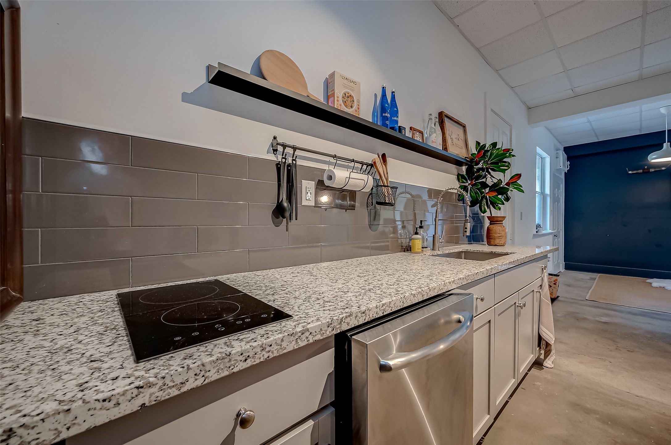 1612 West Alabama Street, Unit ABCD Houston, TX 77006 - Photo 22 of 50 a kitchen with a sink a stove and cabinets