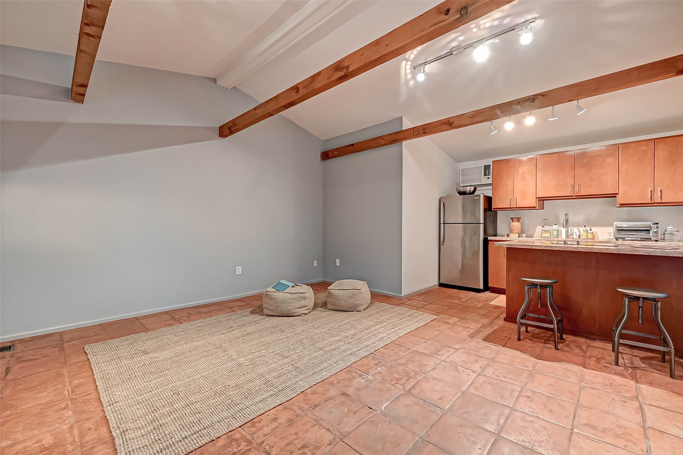 1612 West Alabama Street, Unit ABCD Houston, TX 77006 - Photo 50 of 50 a room with stainless steel appliances kitchen island granite countertop furniture and a view of kitchen